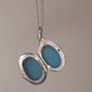Small Sterling silver locket pendant on a silver chain Image 3