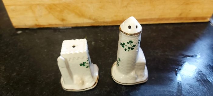 salt and pepper carrigaline pottery,cork Ireland shamrock set gold rim ,nice condition,buyer collects or pays postage thank you, sold as is
