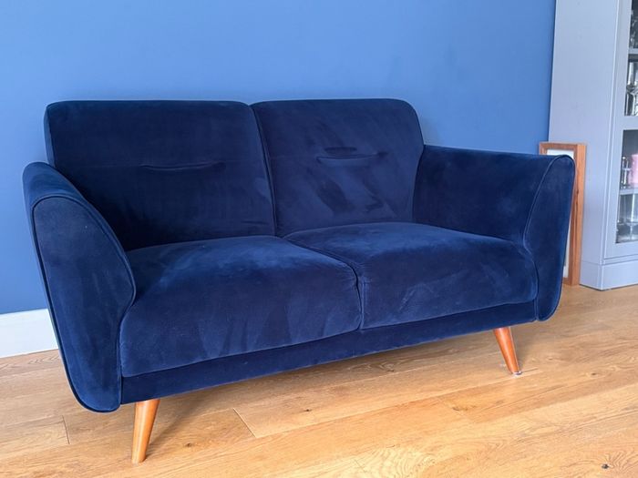 Navy velvet two seater sofa