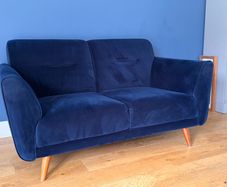 Navy velvet two seater sofa
