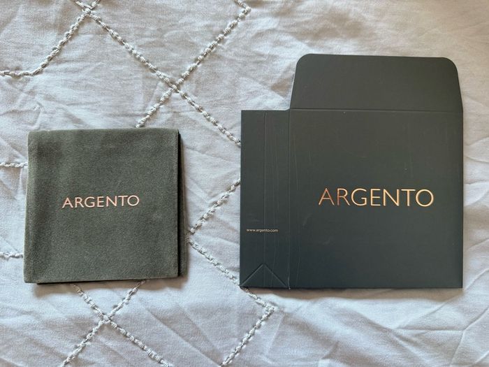 Brand new Argento pouch and box