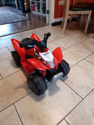 Kids' electric quad bike