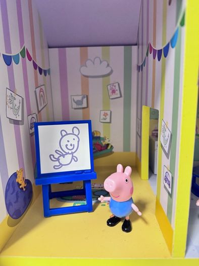 Peppa Pig wooden house with Baby Evie RRP 69.99