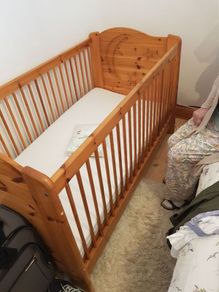 Cot, mattress and sleep protector