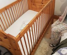 Cot, mattress and sleep protector