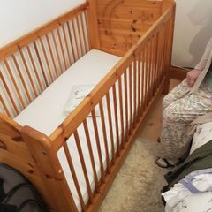 Cot, mattress and sleep protector