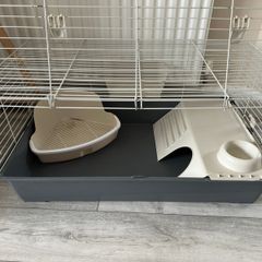 Rabbit cage and pet transport carrier.