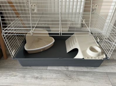 Rabbit cage and pet transport carrier.