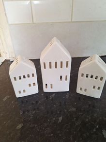 Three lovely ceramic tea light holders