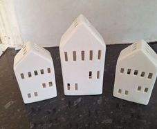Three lovely ceramic tea light holders