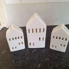 Three lovely ceramic tea light holders
