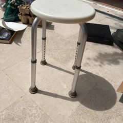 Adjustable shower stool