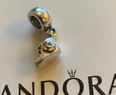 Pandora Charm it's a baby boy bootie with Gold and blue CZ