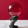 Red crystal/glass ball and metal dragon stand. Image 2