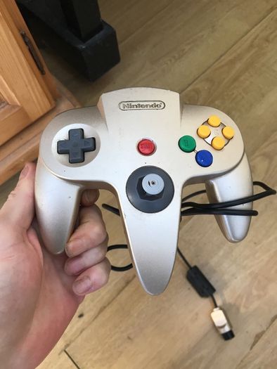 N64 with 2x Controllers along with Mario Kart/1080 Snowboarding