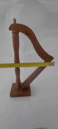 handcrafted wooden display harp ,,lovely display item for any man cave pub restaurant etc etc etc, buyer collects or pays postage.