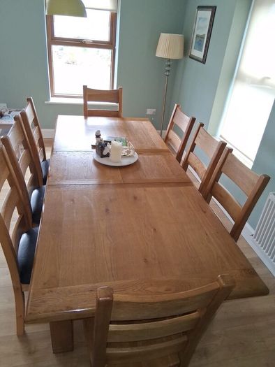 Solid Oak Dining table and 8 chairs