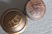military buttons.