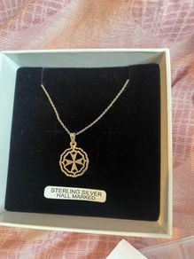 sterling silver cross like pendant on 925 chain