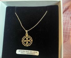 sterling silver cross like pendant on 925 chain