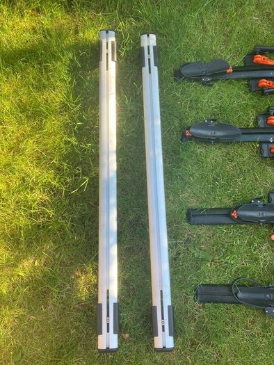 Roof bars and roof mounted bike rack carriers