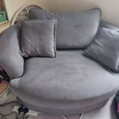 Grey swivel love seat