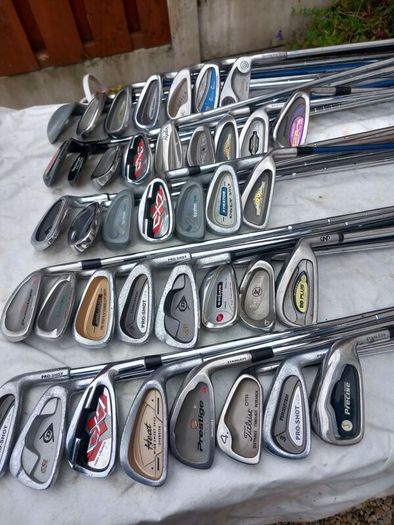 A selection of golf clubs and bags. NOT SELLING SEPARATE