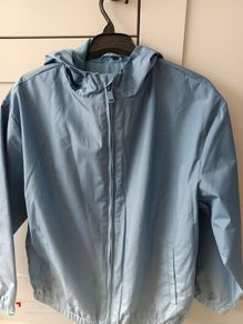 NEW.boy's light jacket. Size 31/32