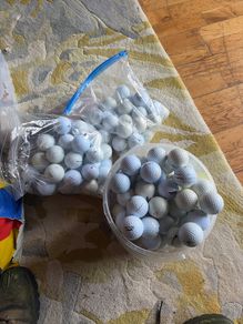 140 golf balls