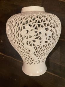 This is an Oriental   Blanc de Chine reticulated Vase