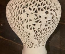 This is an Oriental   Blanc de Chine reticulated Vase
