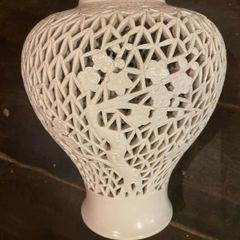 This is an Oriental   Blanc de Chine reticulated Vase