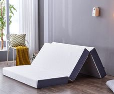 Double folding Matress with cover. Size 135 by 190