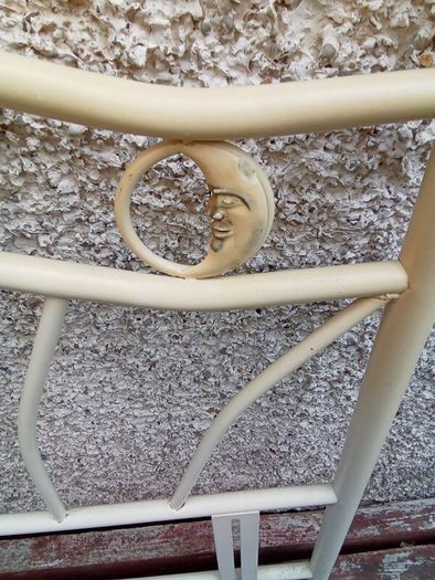 Metal single bed head frame.