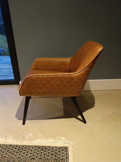 Faux leather armchair