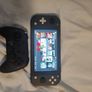 Nintendo switch + controller+20 games installed on it Image 7