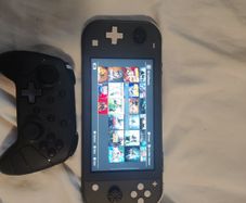 Nintendo switch + controller + 20 games