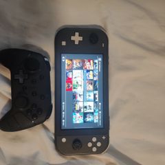 Nintendo switch + controller + 20 games