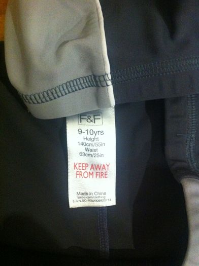 Two pairs of Boys swimming trunks, aged 9-10 years.