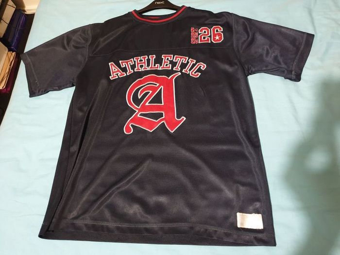 rebel athletic navy blue red shirt