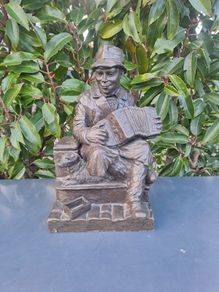 the busker figure