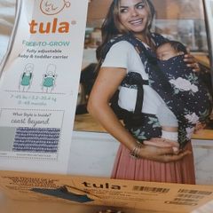 TULA  sling Free to Grow. Fully adjustable baby and toddler carrier.  In excellent condition.  Light use for 1 child. Baby insert never used. Suitable from 3.2kg to 20.4 kg.