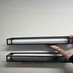 Black metal shelves
