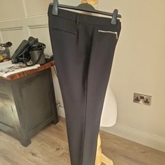 Black tailored trousers
