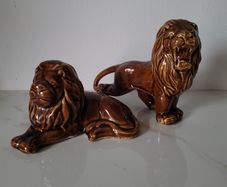 Vintage pair of glazed ceramic lions