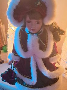 Christmas porcelain doll