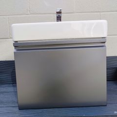 Laufen sink and cabinet with tap