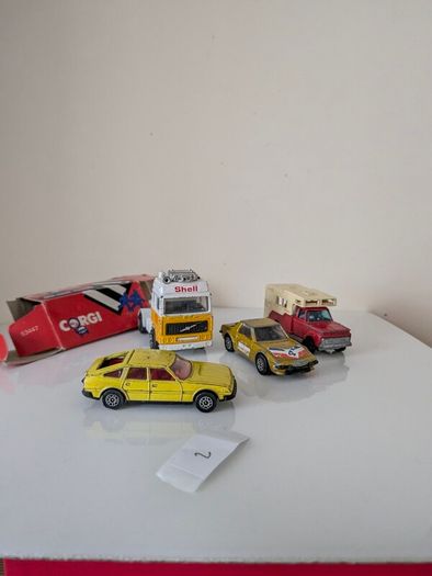4 vintage Corgi Juniors die-cast models, made in Great Britain. These are classic 1:64 scale models