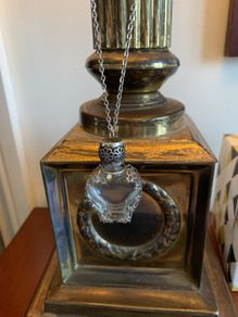 Glass vial jewellery chain
