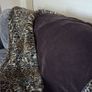 Large leopard skin fur throw and cushions Image 3